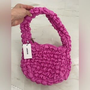 Very cute hand/shoulder Jason Wu bag.  Hot pink
